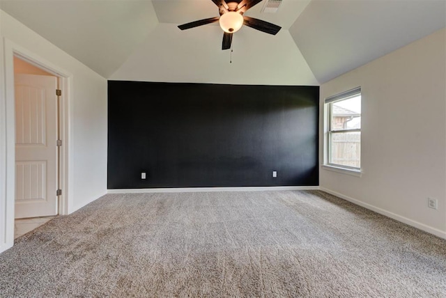 1632 NE 35th St, Moore, OK 73160 - carpeted spare room with vaulted ceiling and a ceiling fan