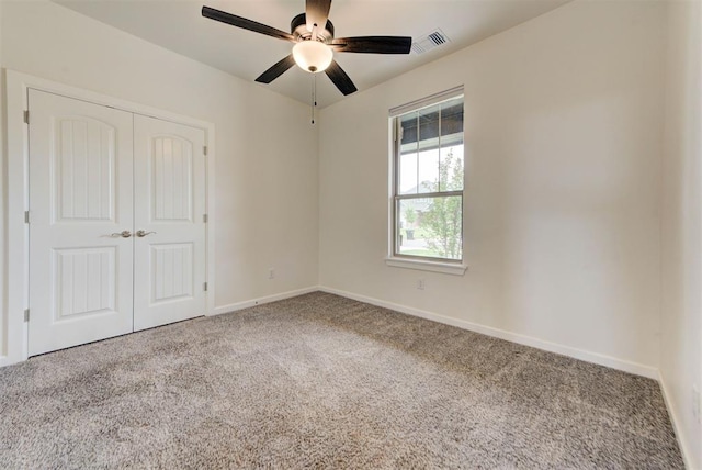1632 NE 35th St, Moore, OK 73160 - unfurnished bedroom with carpet flooring, a closet, and ceiling fan