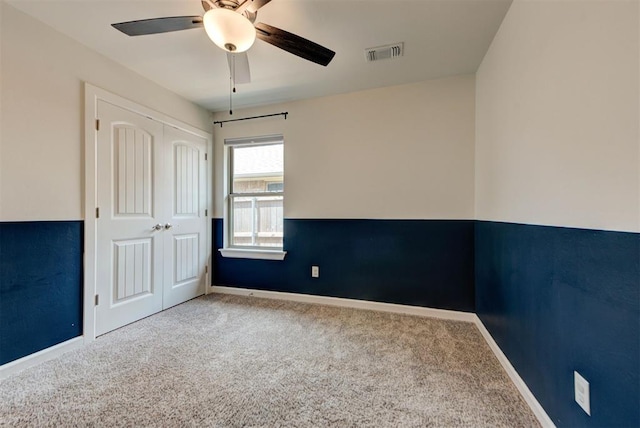 1632 NE 35th St, Moore, OK 73160 - unfurnished bedroom featuring carpet floors, a closet, and a ceiling fan