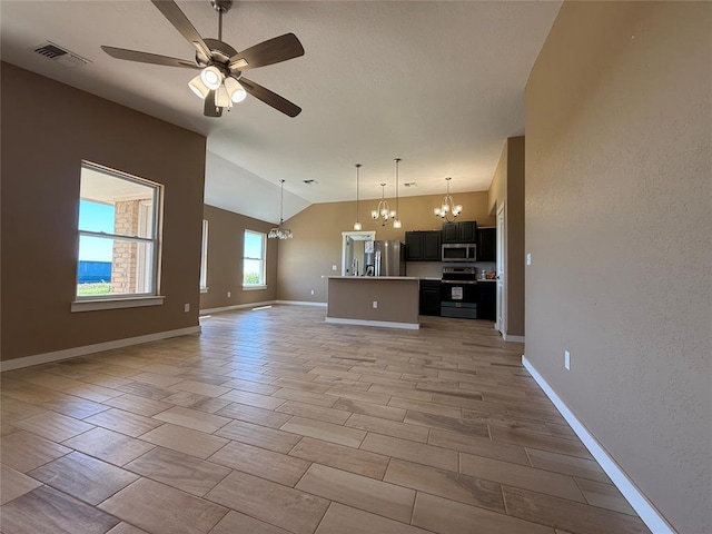 1808 Sommerset Pl, Altus, OK 73521 - unfurnished living room featuring a chandelier, ceiling fan, and vaulted ceiling