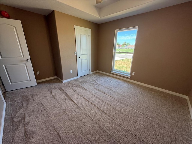 1808 Sommerset Pl, Altus, OK 73521 - spare room with light carpet and a ceiling fan