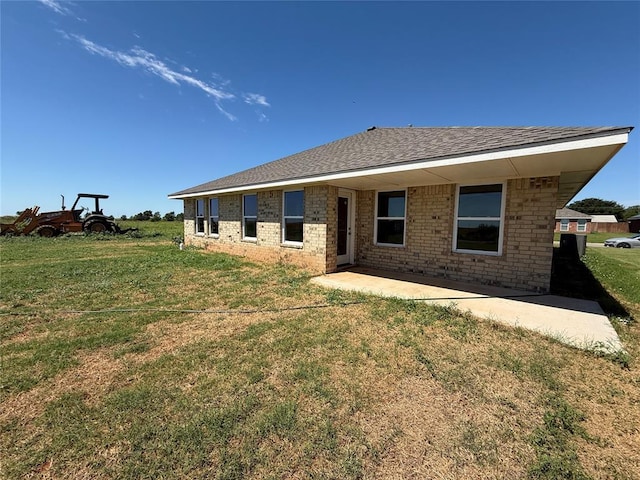 1808 Sommerset Pl, Altus, OK 73521 - back of house with a yard and a patio