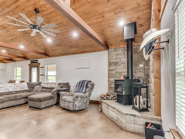 1036 County St Unit 2982, Blanchard, OK 73010 - living room with finished concrete flooring, a wooden ceiling with exposed beams, ceiling fan, a wood stove, and recessed lighting
