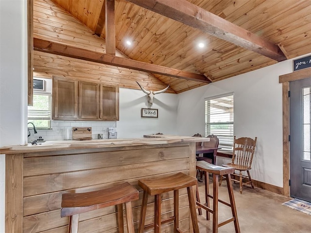 1036 County St Unit 2982, Blanchard, OK 73010 - bar with finished concrete flooring, wooden ceiling, decorative backsplash, healthy amount of natural light, and recessed lighting