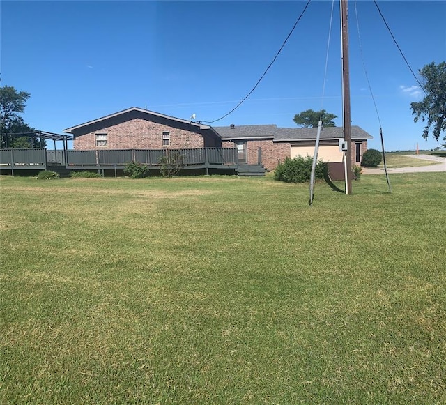 28153 County Street 2540Th, St, Fort Cobb, OK 73038 - view of green lawn with a wooden deck
