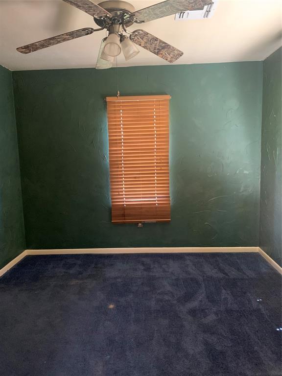28153 County Street 2540Th, St, Fort Cobb, OK 73038 - carpeted empty room featuring a ceiling fan and baseboards