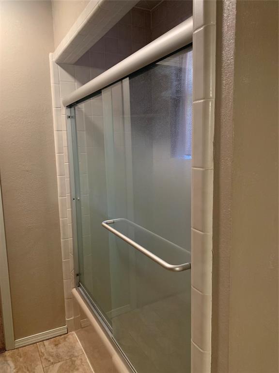 28153 County Street 2540Th, St, Fort Cobb, OK 73038 - bathroom featuring tile patterned flooring and a textured wall