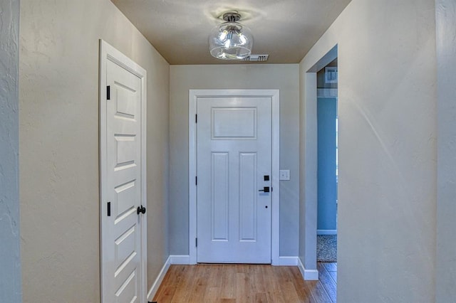 6413 SE 84th St, Oklahoma City, OK 73135 - doorway with light wood-style flooring and baseboards
