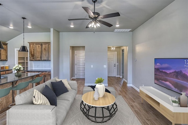 6413 SE 84th St, Oklahoma City, OK 73135 - living area featuring wood finished floors, ceiling fan, recessed lighting, and vaulted ceiling