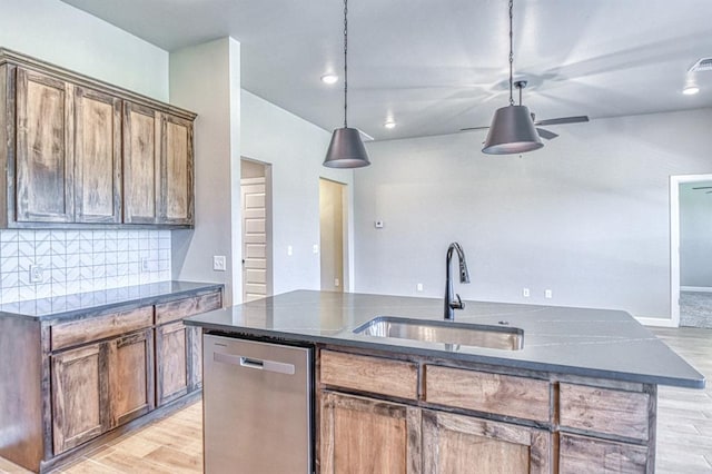 6413 SE 84th St, Oklahoma City, OK 73135 - kitchen featuring dishwasher, light wood-style floors, decorative backsplash, and a ceiling fan