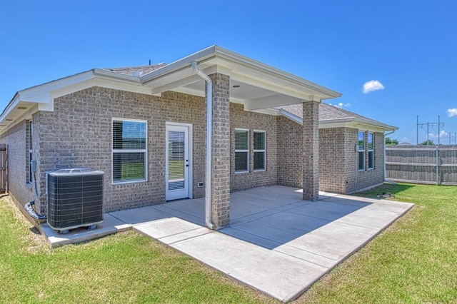 6413 SE 84th St, Oklahoma City, OK 73135 - rear view of house featuring a patio area and brick siding