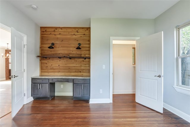 1800 NW 38th St, Oklahoma City, OK 73118 - unfurnished office featuring dark wood-type flooring and built in desk