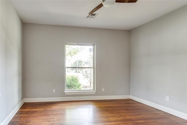1800 NW 38th St, Oklahoma City, OK 73118 - unfurnished room featuring plenty of natural light, ceiling fan, and wood finished floors