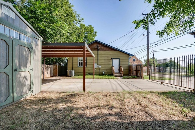 1800 NW 38th St, Oklahoma City, OK 73118 - view of parking featuring a carport