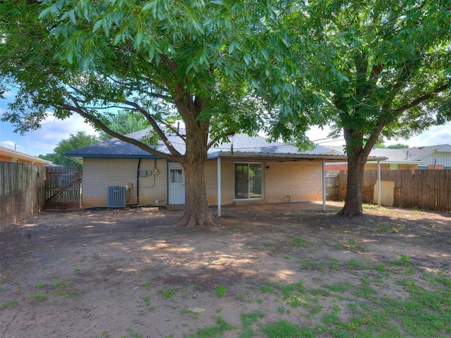 3044 S Madole Blvd, Oklahoma City, OK 73159 - rear view of house with brick siding
