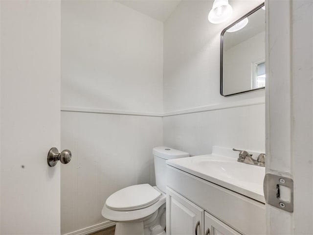 3044 S Madole Blvd, Oklahoma City, OK 73159 - half bath with vanity and a wainscoted wall