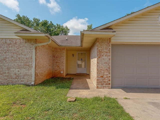 1106 Foggy Bottom Rd, Tecumseh, OK 74873 - property entrance with brick siding, a garage, and a shingled roof