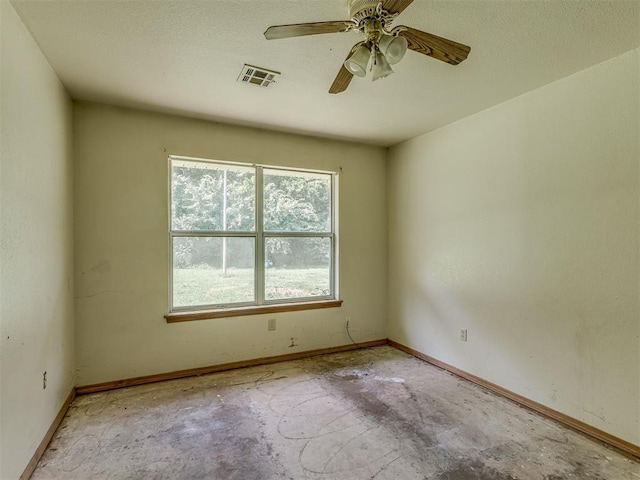 1106 Foggy Bottom Rd, Tecumseh, OK 74873 - unfurnished room with baseboards and ceiling fan