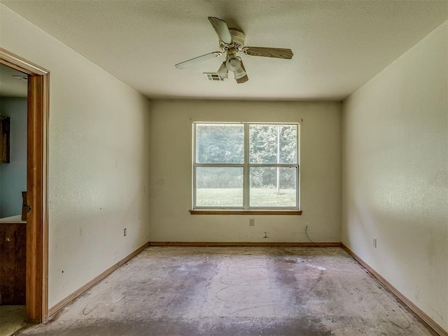1106 Foggy Bottom Rd, Tecumseh, OK 74873 - spare room with a ceiling fan and unfinished concrete flooring