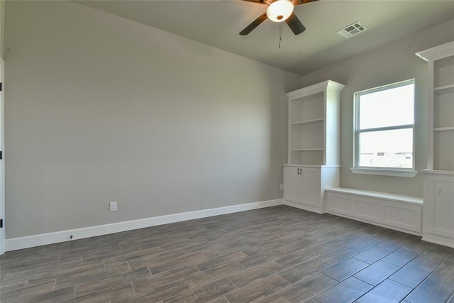 10617 Little Sallisaw Creek Dr, Yukon, OK 73099 - unfurnished room with dark wood-style flooring and a ceiling fan