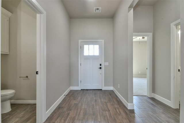10617 Little Sallisaw Creek Dr, Yukon, OK 73099 - foyer entrance featuring dark wood-style flooring and a ceiling fan