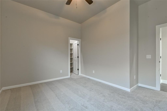 10617 Little Sallisaw Creek Dr, Yukon, OK 73099 - spare room with carpet, ceiling fan, and lofted ceiling
