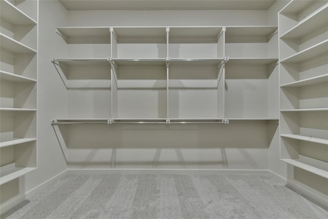 10617 Little Sallisaw Creek Dr, Yukon, OK 73099 - walk in closet featuring carpet