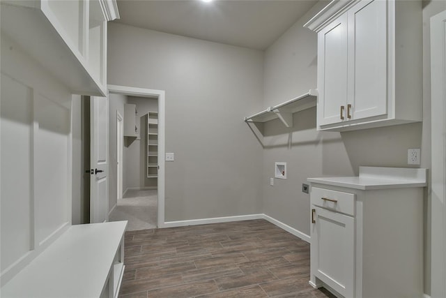 10617 Little Sallisaw Creek Dr, Yukon, OK 73099 - washroom with electric dryer hookup, hookup for a washing machine, dark wood-type flooring, and cabinet space