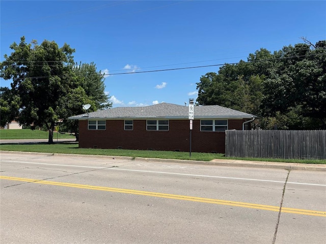 611 Garth Brooks Blvd, Yukon, OK 73099 - view of side of property featuring brick siding and crawl space