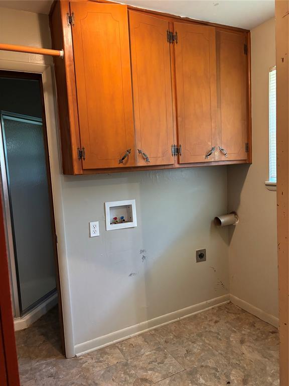 611 Garth Brooks Blvd, Yukon, OK 73099 - washroom featuring cabinet space, washer hookup, and hookup for an electric dryer