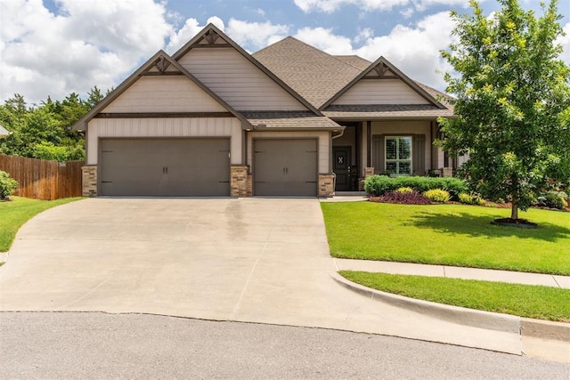 8040 Sweetgum St, Edmond, OK 73034 - craftsman house with a garage, driveway, and roof with shingles