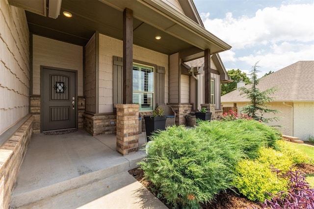 8040 Sweetgum St, Edmond, OK 73034 - entrance to property with a porch