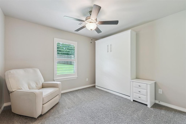 8040 Sweetgum St, Edmond, OK 73034 - living area featuring carpet and ceiling fan