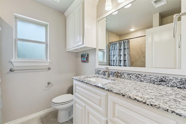 8040 Sweetgum St, Edmond, OK 73034 - full bathroom with vanity, tile patterned flooring, and tiled shower