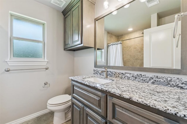 8040 Sweetgum St, Edmond, OK 73034 - full bathroom with vanity and tiled shower