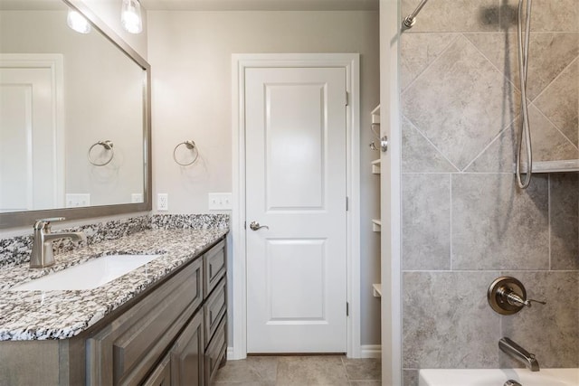 8040 Sweetgum St, Edmond, OK 73034 - full bathroom featuring vanity and bathing tub / shower combination