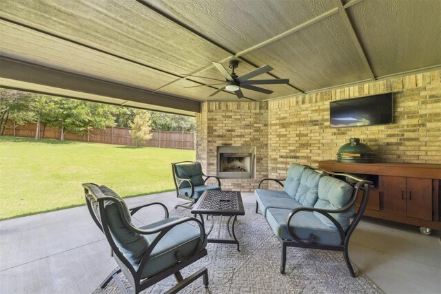 8040 Sweetgum St, Edmond, OK 73034 - view of patio featuring a ceiling fan and an outdoor living space with a fireplace