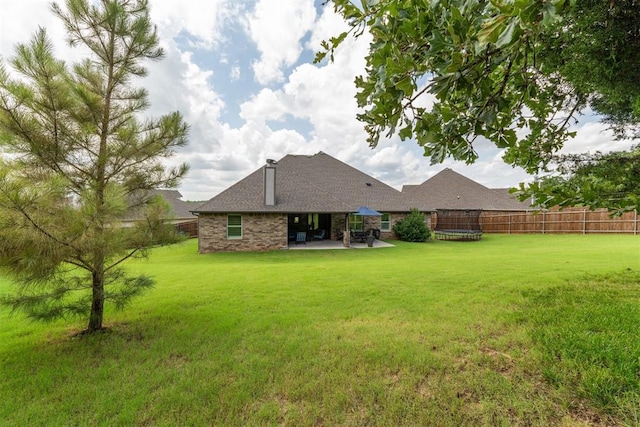 8040 Sweetgum St, Edmond, OK 73034 - back of property featuring a patio