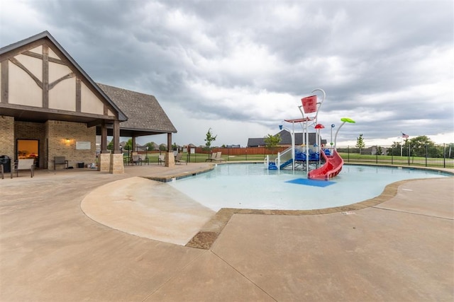 8040 Sweetgum St, Edmond, OK 73034 - community pool featuring a patio area and a water play area