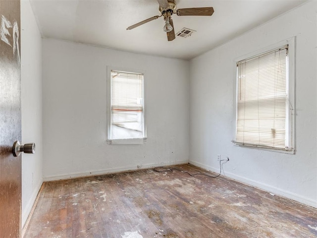 816 NE 31st St, Oklahoma City, OK 73105 - spare room featuring wood-type flooring and ceiling fan
