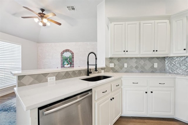 3343 Teton Cir, Norman, OK 73072 - kitchen featuring stainless steel dishwasher, ceiling fan, healthy amount of natural light, light countertops, and lofted ceiling