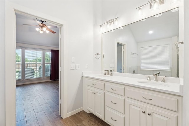 3343 Teton Cir, Norman, OK 73072 - bathroom featuring double vanity, a ceiling fan, and wood finished floors