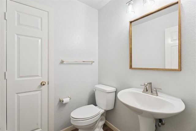3343 Teton Cir, Norman, OK 73072 - half bathroom featuring toilet and a sink