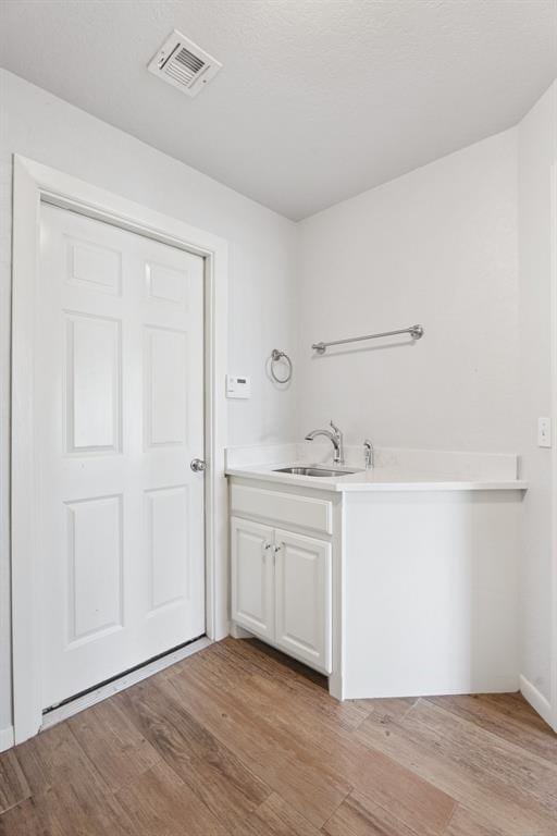 3343 Teton Cir, Norman, OK 73072 - bathroom featuring wood finished floors and vanity