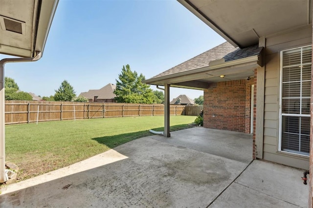 3343 Teton Cir, Norman, OK 73072 - fenced backyard featuring a patio