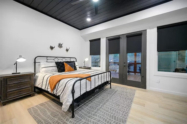 156 Butternut Trl, Broken Bow, OK 74728 - bedroom with access to outside, wood finished floors, wooden ceiling, and french doors