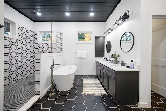 156 Butternut Trl, Broken Bow, OK 74728 - full bath featuring a walk in shower, double vanity, a soaking tub, recessed lighting, and tile patterned floors