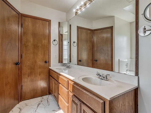 400 Ryan Way, Edmond, OK 73003 - bathroom with marble finish flooring and double vanity