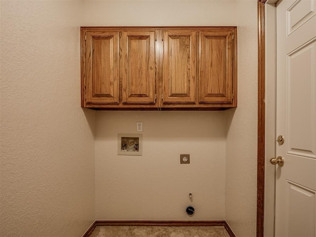 400 Ryan Way, Edmond, OK 73003 - laundry room with electric dryer hookup, hookup for a washing machine, and cabinet space