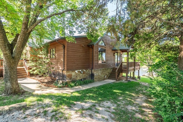 39 E Shore Dr, Arcadia, OK 73007 - view of side of home with stairs, a deck, and a yard